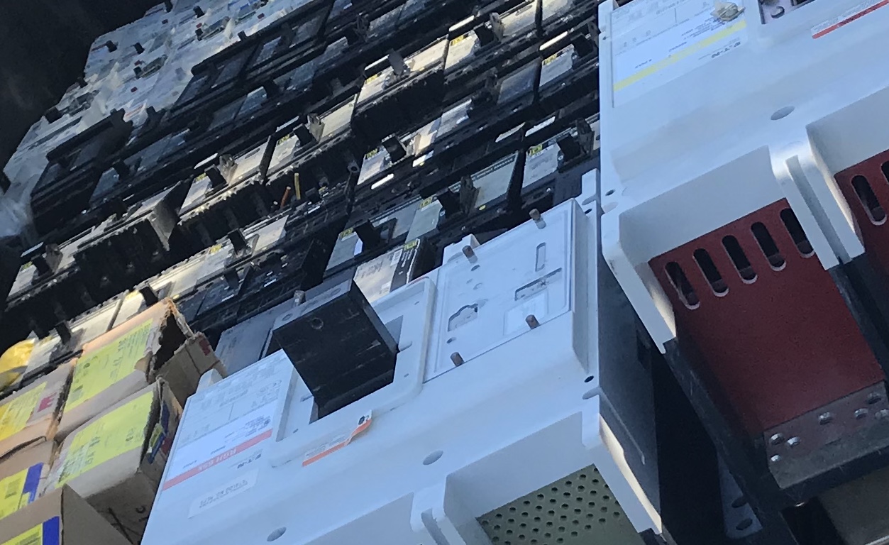 Circuit breakers we recently purchased, laid out for inspection